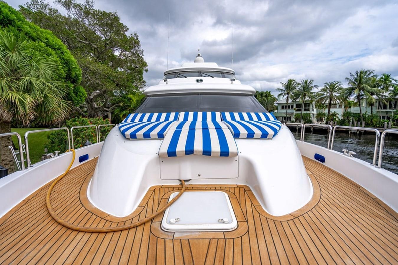 a boat on a deck aboard TOP SHELF Yacht for Sale