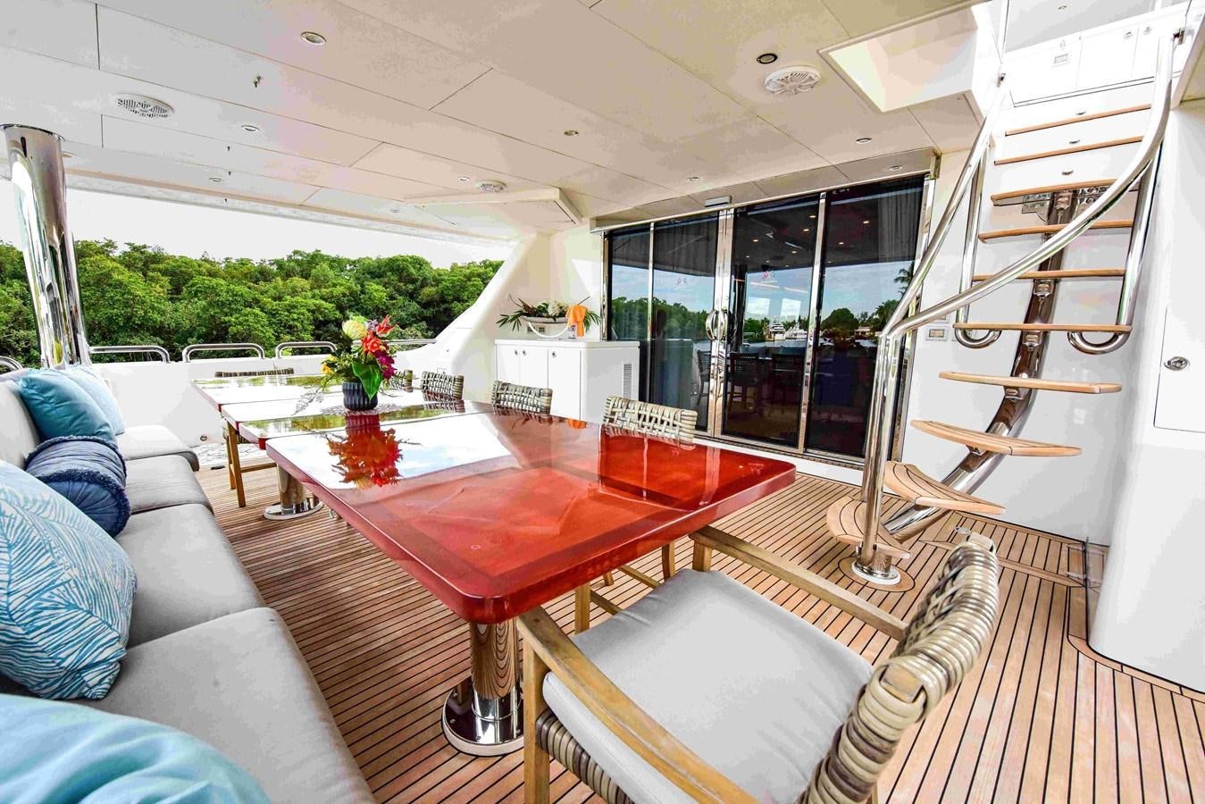 a living room with a large window aboard RENAISSANCE Yacht for Sale