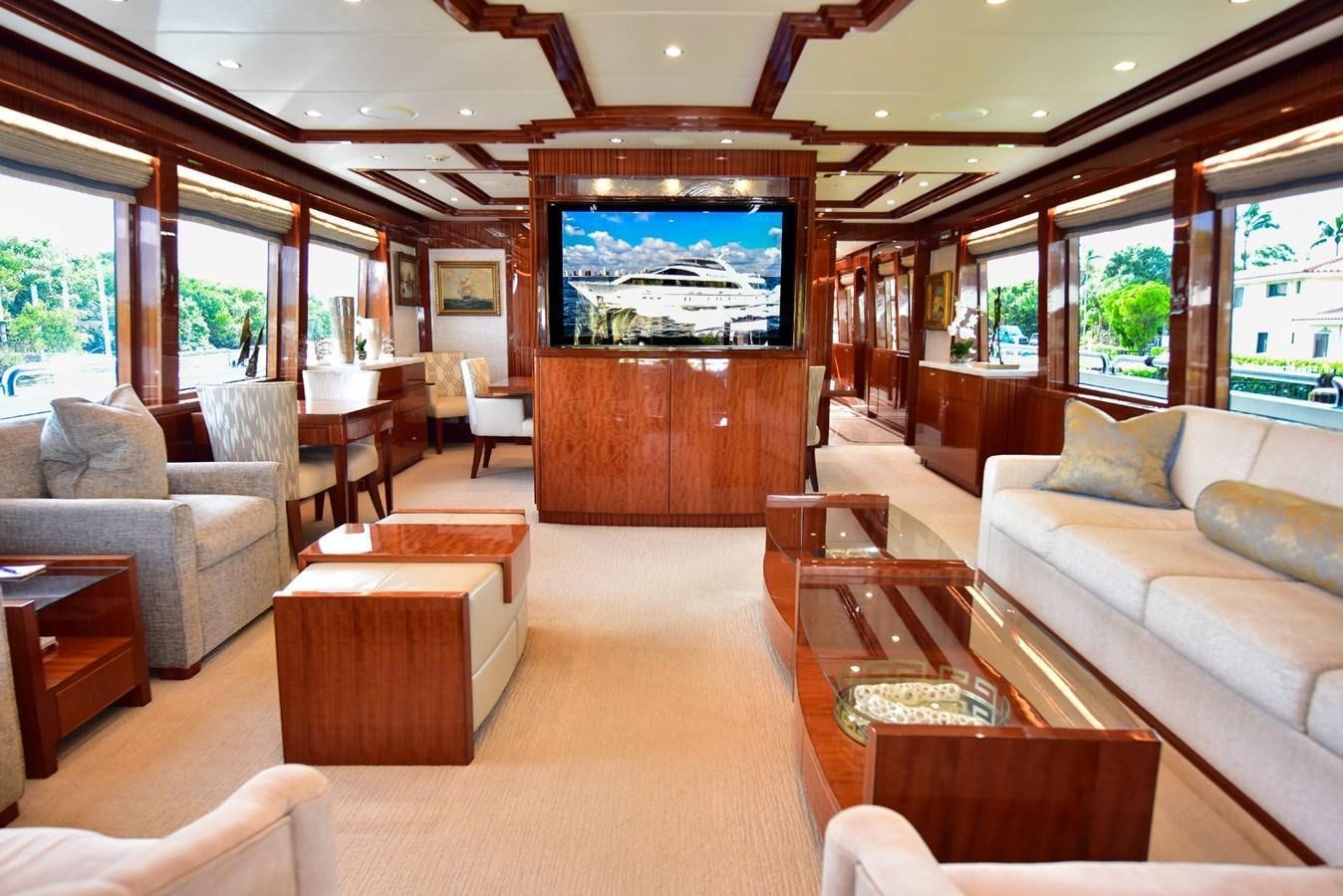a living room with a large screen aboard RENAISSANCE Yacht for Sale