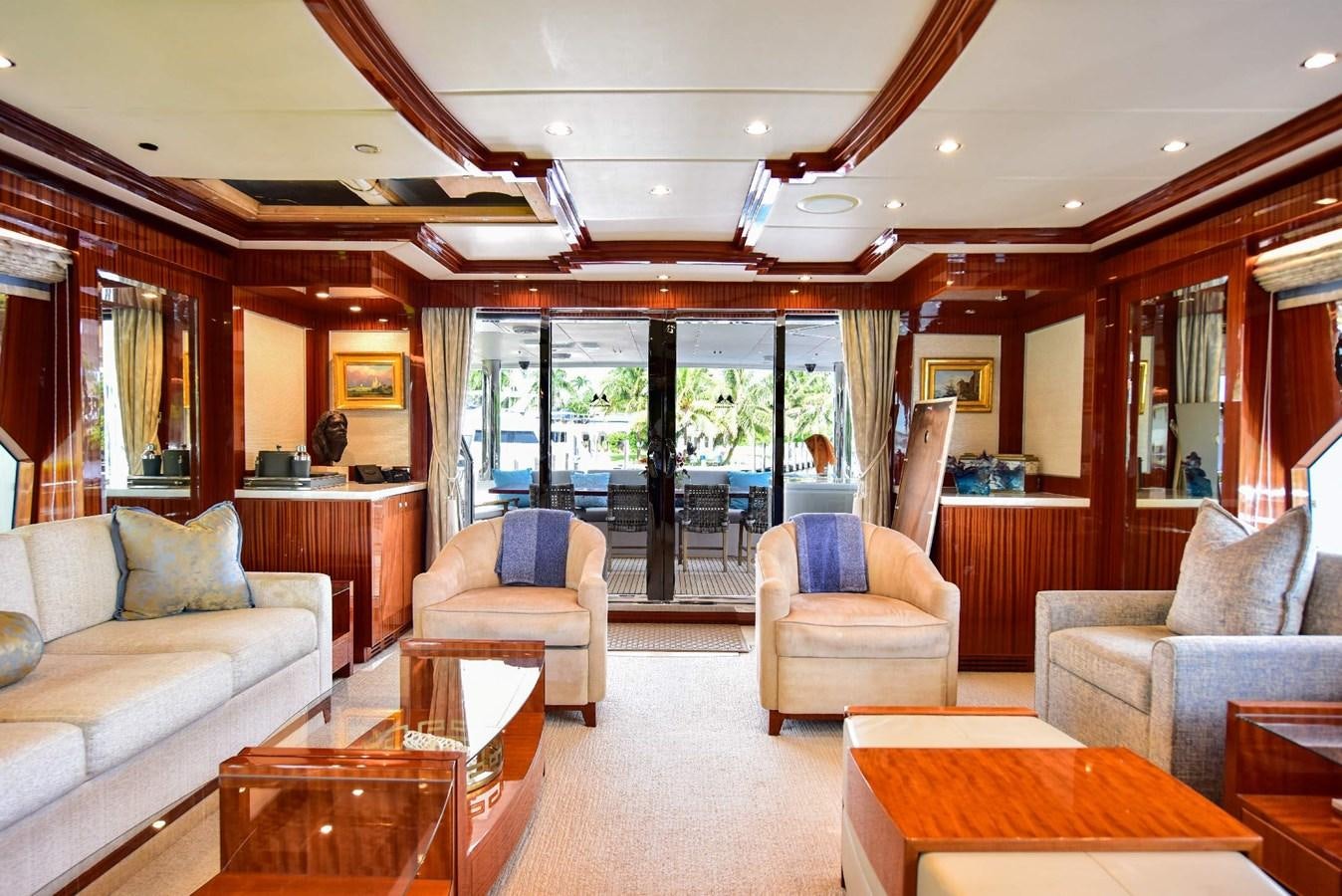 a living room with a large window aboard RENAISSANCE Yacht for Sale