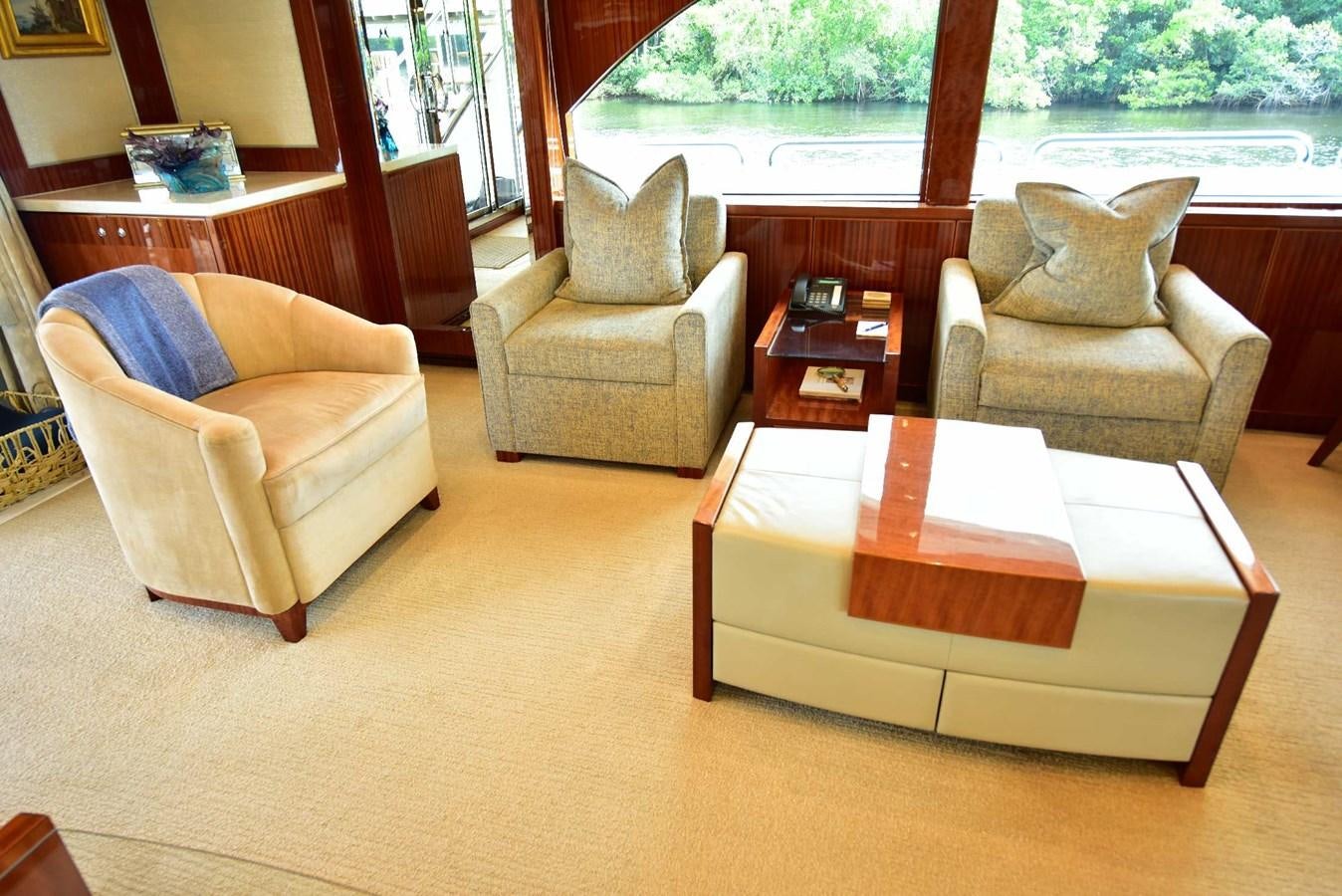 a living room with a couch and a table aboard RENAISSANCE Yacht for Sale