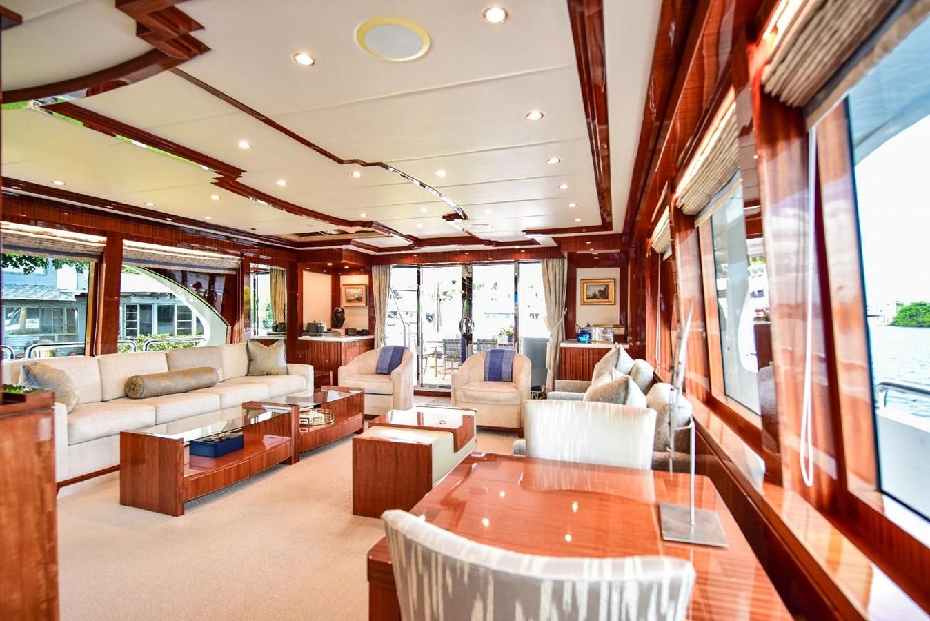 a living room with a large window aboard RENAISSANCE Yacht for Sale
