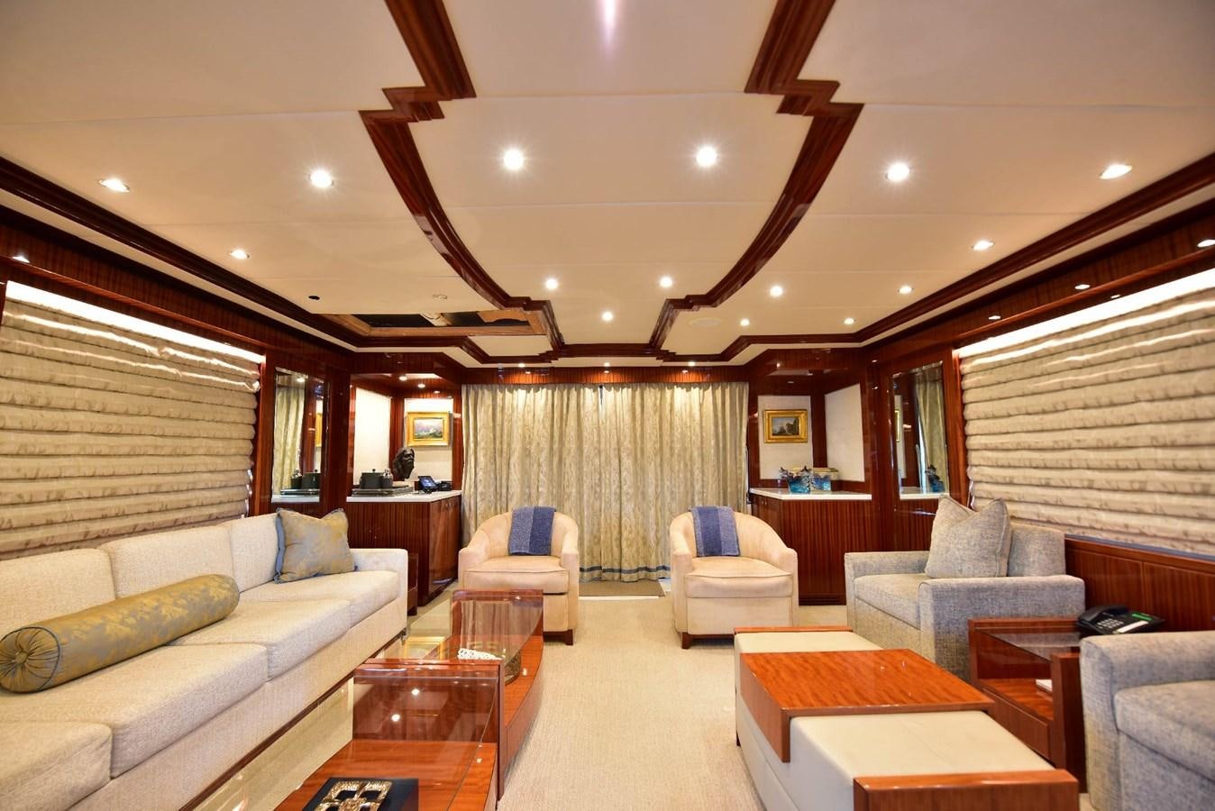 a living room with a large window aboard RENAISSANCE Yacht for Sale