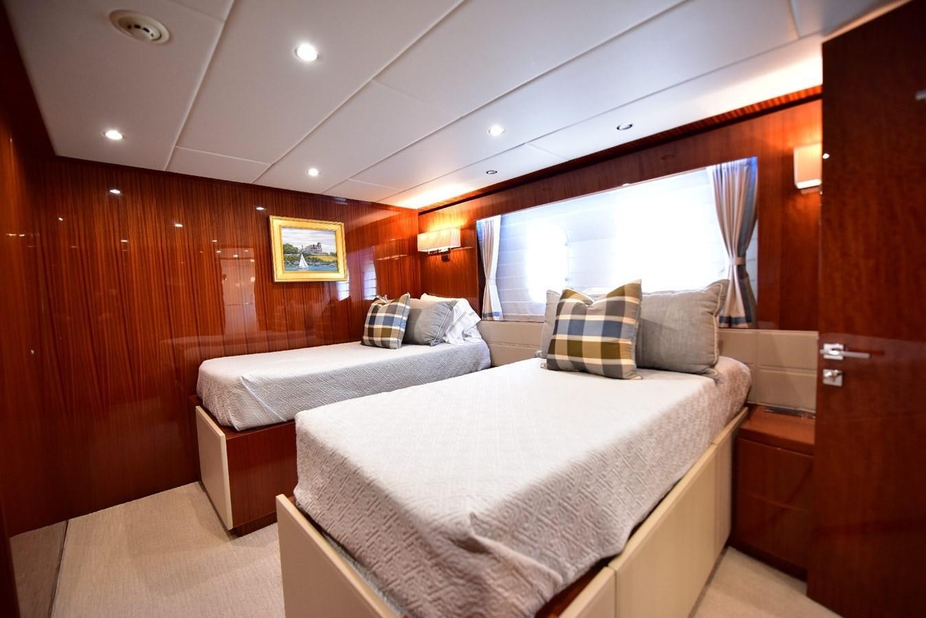 a room with two beds aboard RENAISSANCE Yacht for Sale