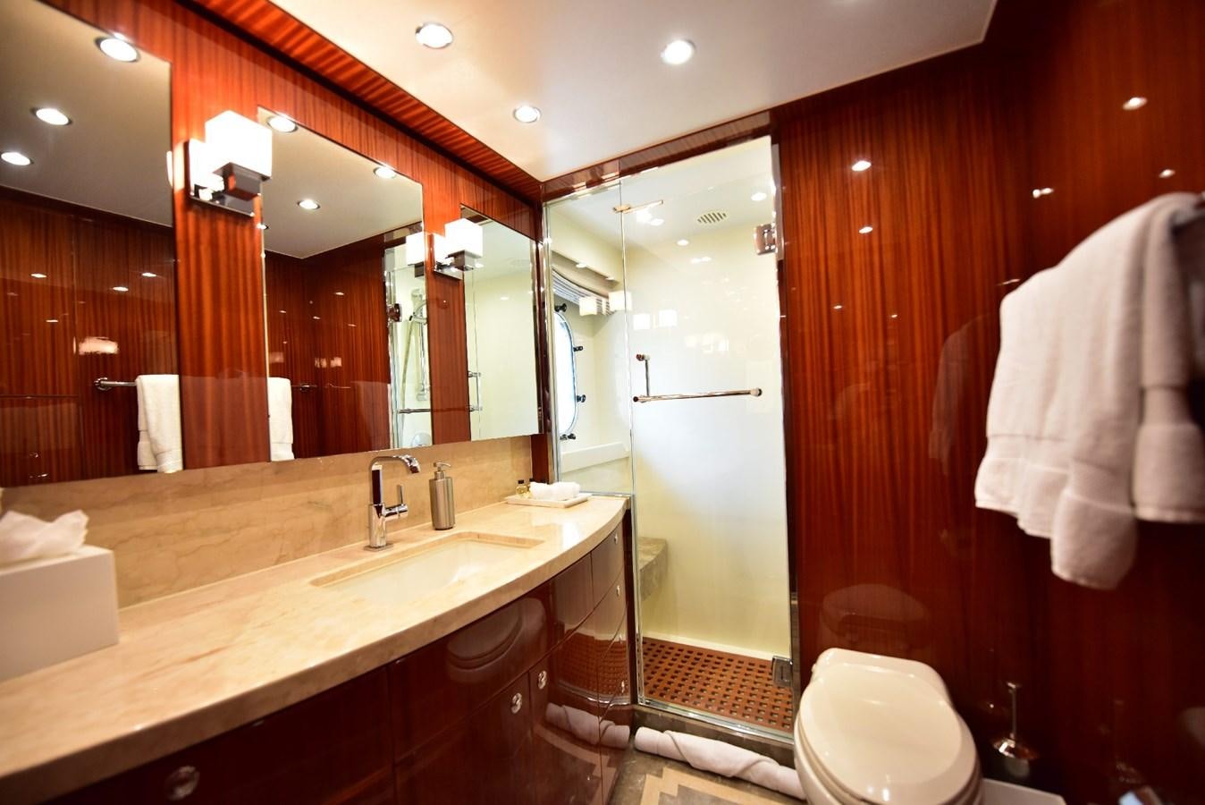 a bathroom with a large mirror aboard RENAISSANCE Yacht for Sale