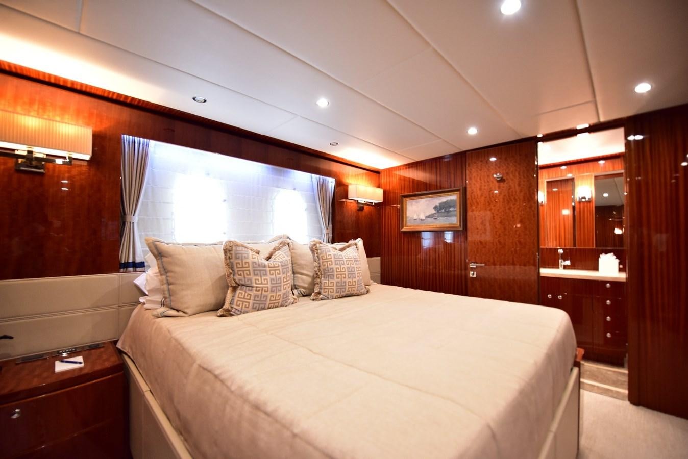 a bed in a room aboard RENAISSANCE Yacht for Sale