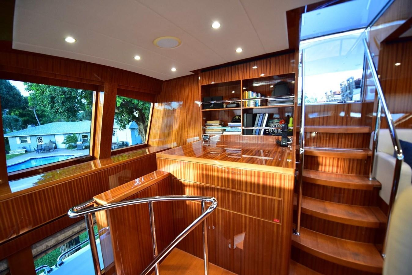 a room with wooden bunk beds aboard RENAISSANCE Yacht for Sale