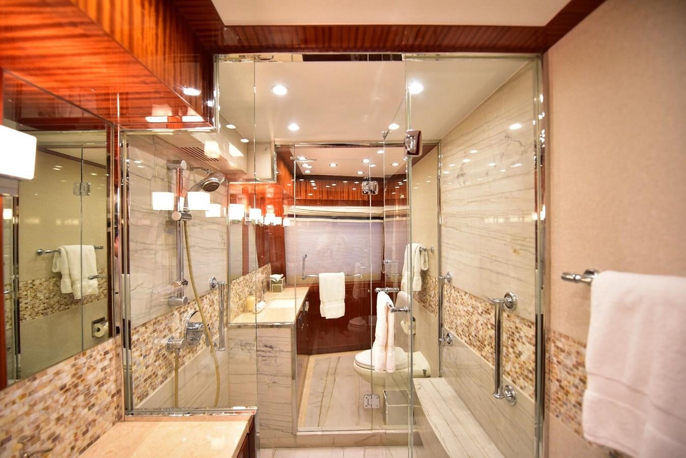 a bathroom with a large mirror aboard RENAISSANCE Yacht for Sale
