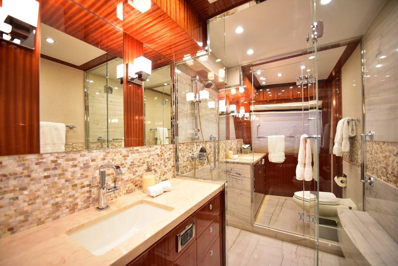 a bathroom with a large mirror aboard RENAISSANCE Yacht for Sale