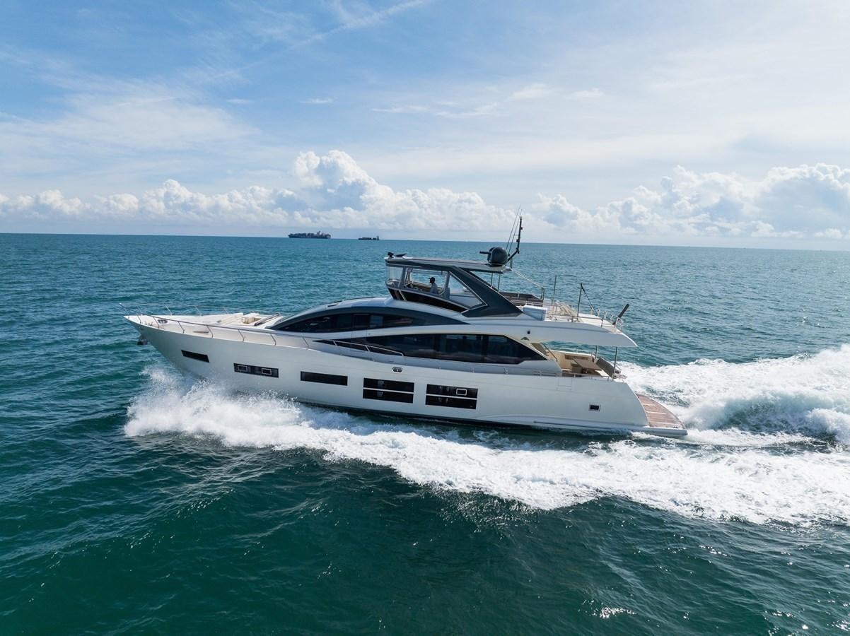 a white yacht on the water aboard SEADUCTION Yacht for Sale