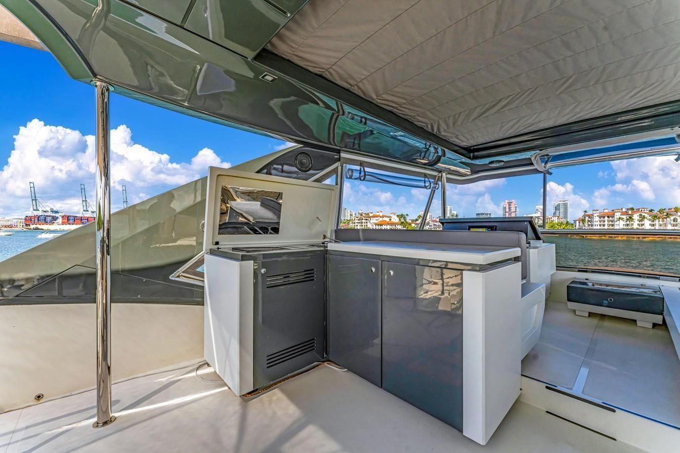 a large room with a large window aboard SEADUCTION Yacht for Sale