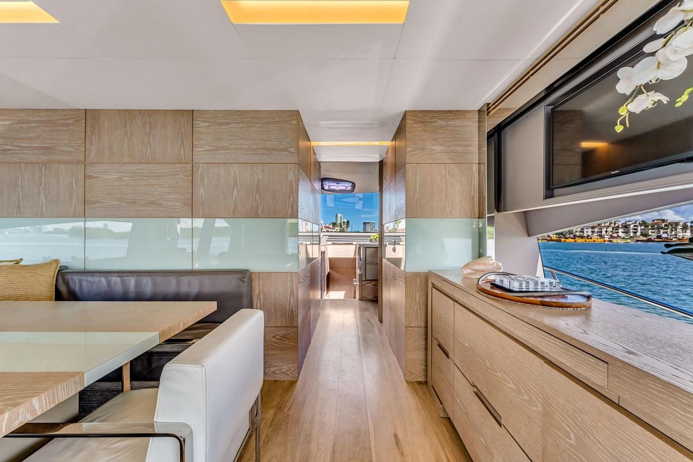 a room with a wood floor and a pool table aboard SEADUCTION Yacht for Sale