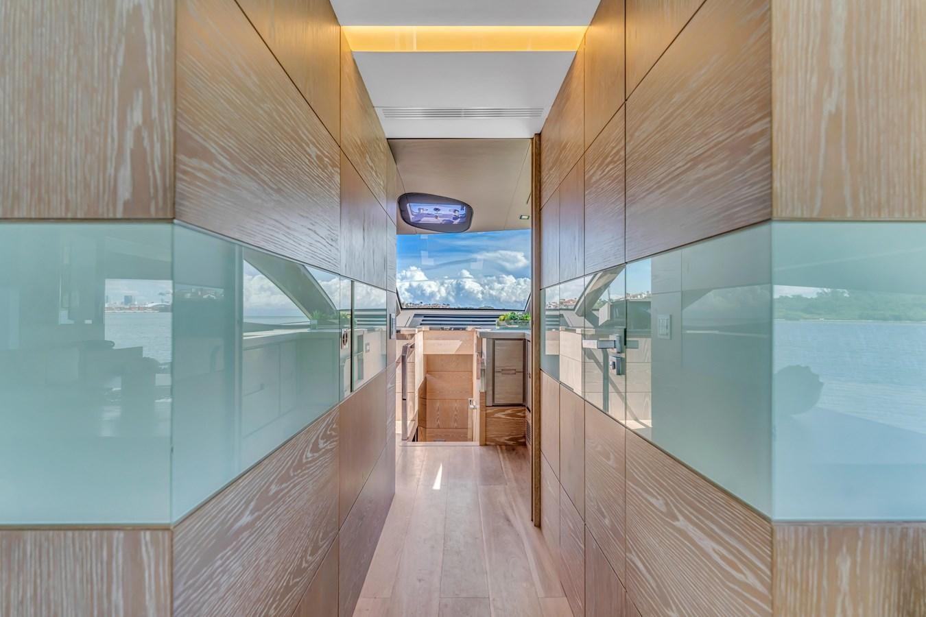 a wood bridge over a pool aboard SEADUCTION Yacht for Sale