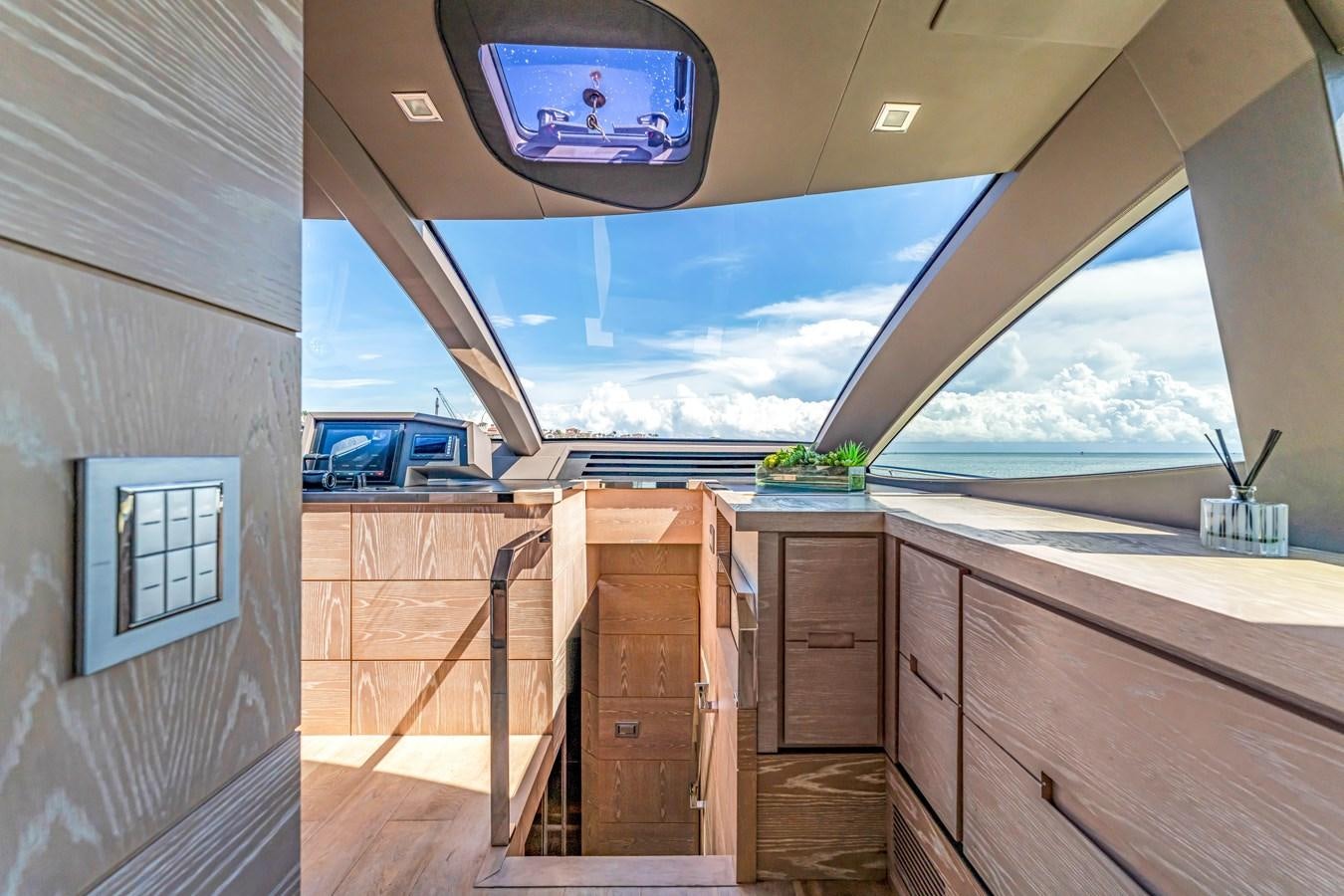 a room with a view of the ocean and the ocean aboard SEADUCTION Yacht for Sale