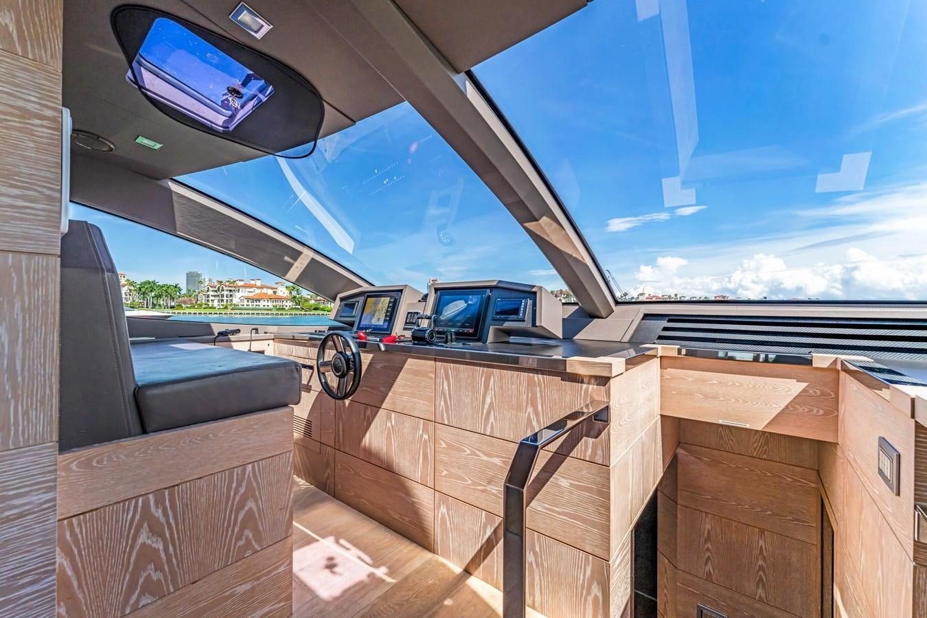 a wooden box with a couple of computers on it aboard SEADUCTION Yacht for Sale