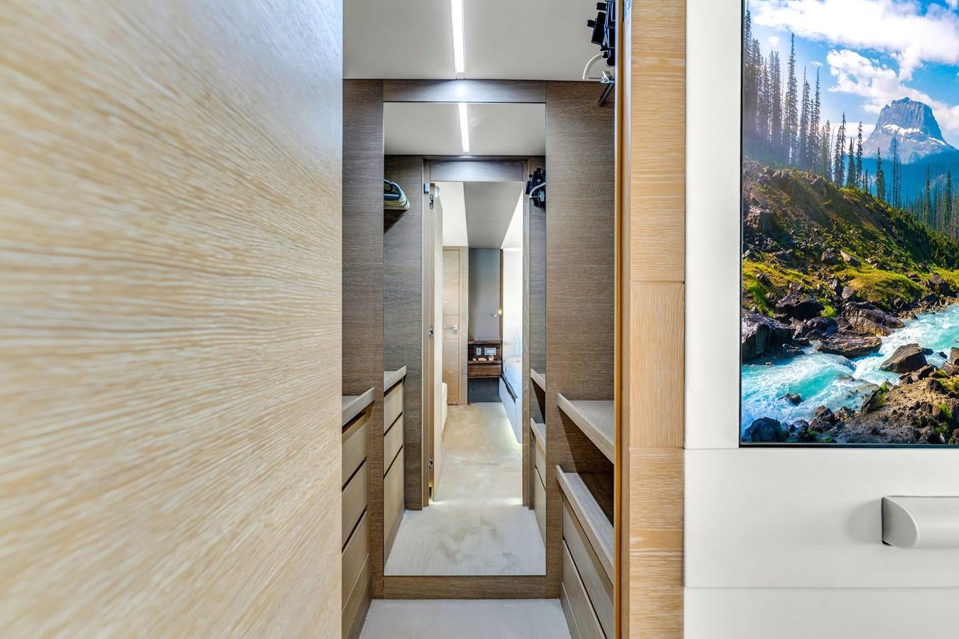 a hallway with a window and a view of a city aboard SEADUCTION Yacht for Sale
