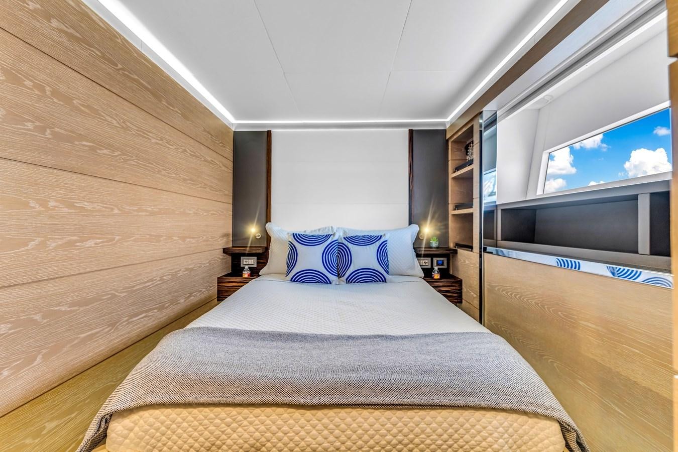 a bed in a room aboard SEADUCTION Yacht for Sale