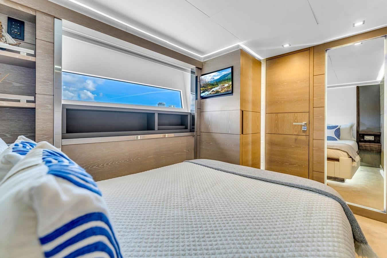 a bed in a room aboard SEADUCTION Yacht for Sale