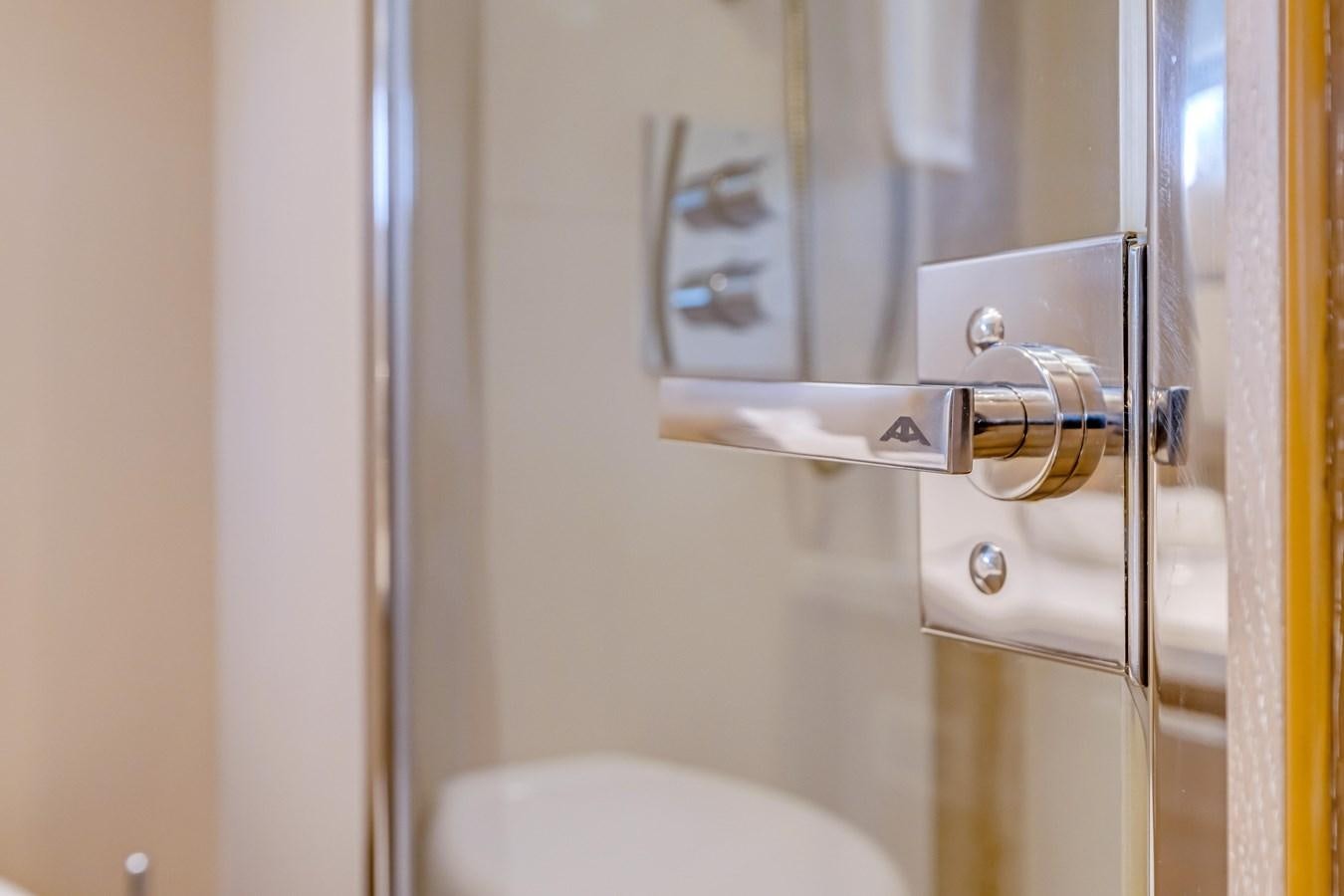 a shower with a glass door aboard SEADUCTION Yacht for Sale