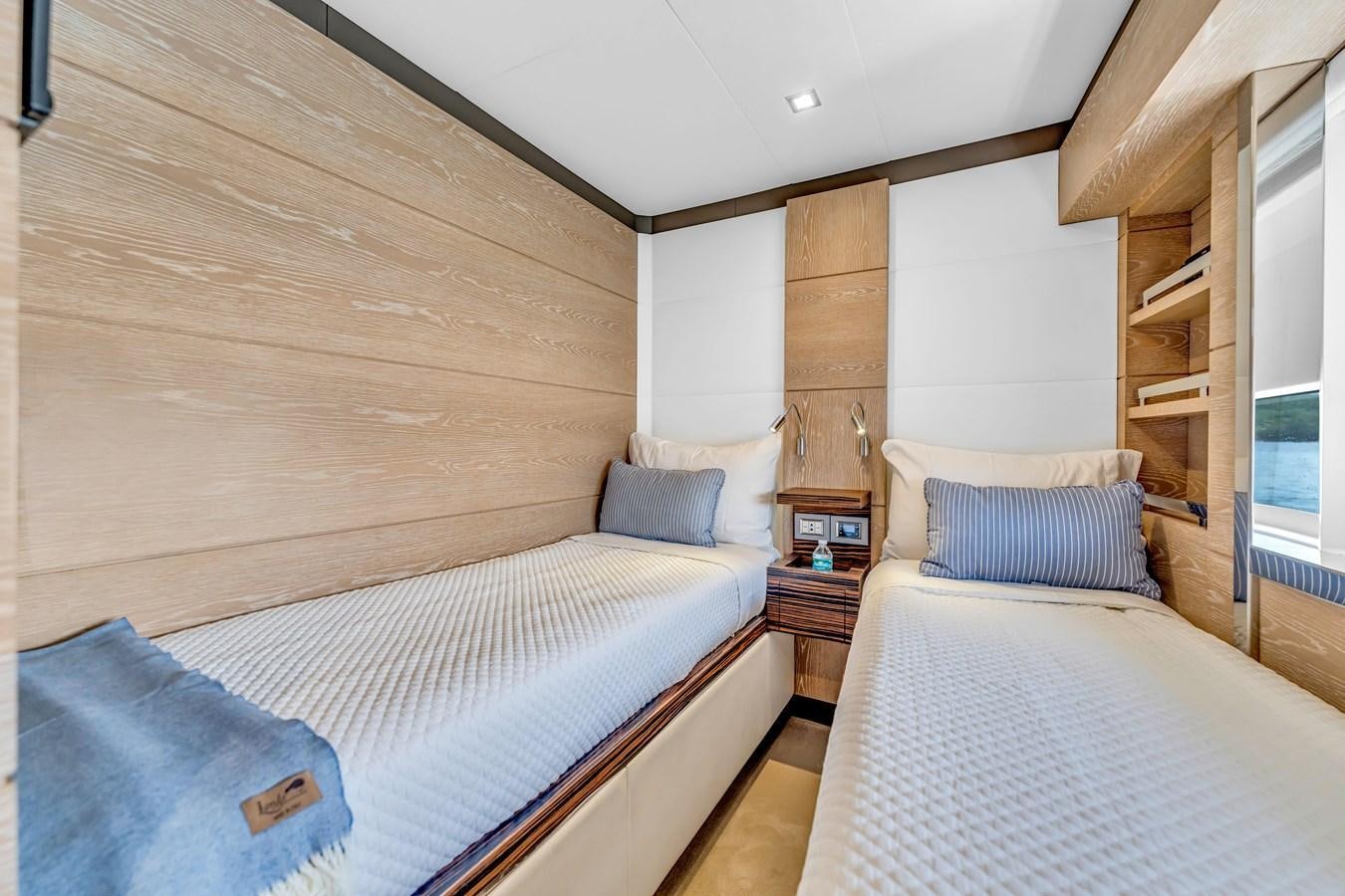 a couple of beds in a room aboard SEADUCTION Yacht for Sale