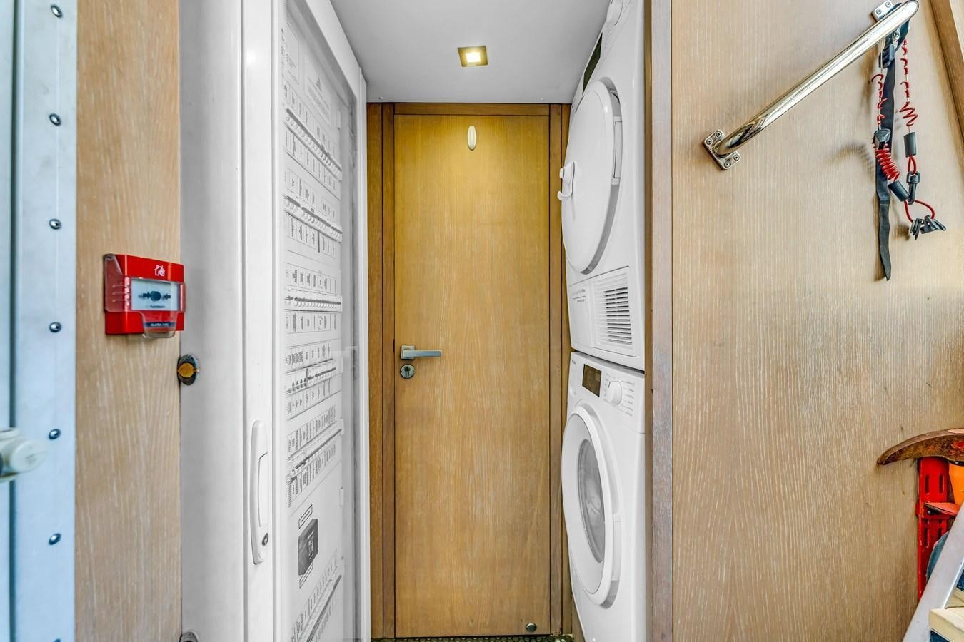 a closet with white doors aboard SEADUCTION Yacht for Sale