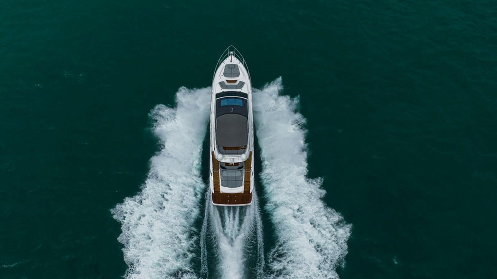 a car driving on a road aboard IMAGINE Yacht for Sale