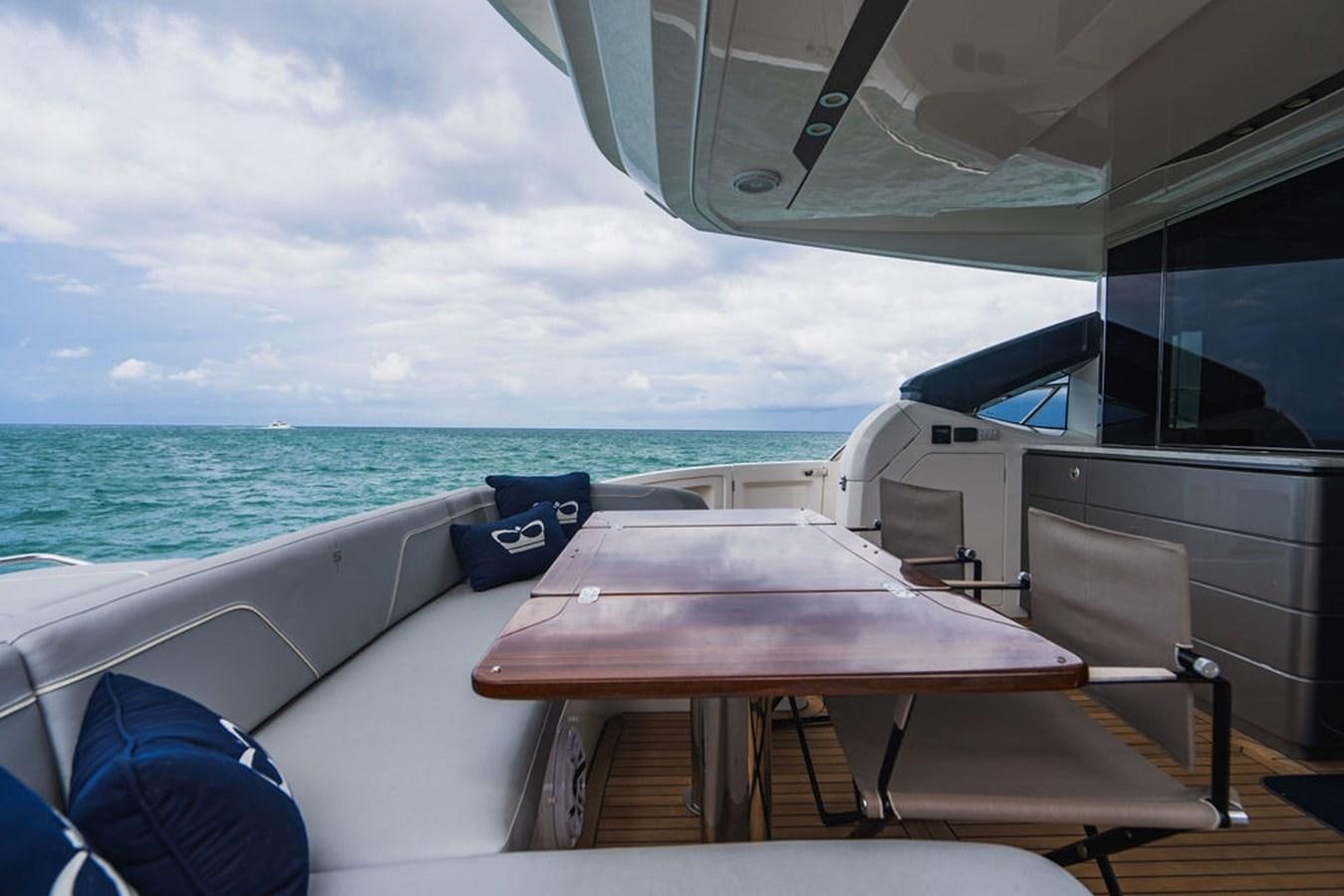 a table on a boat aboard IMAGINE Yacht for Sale