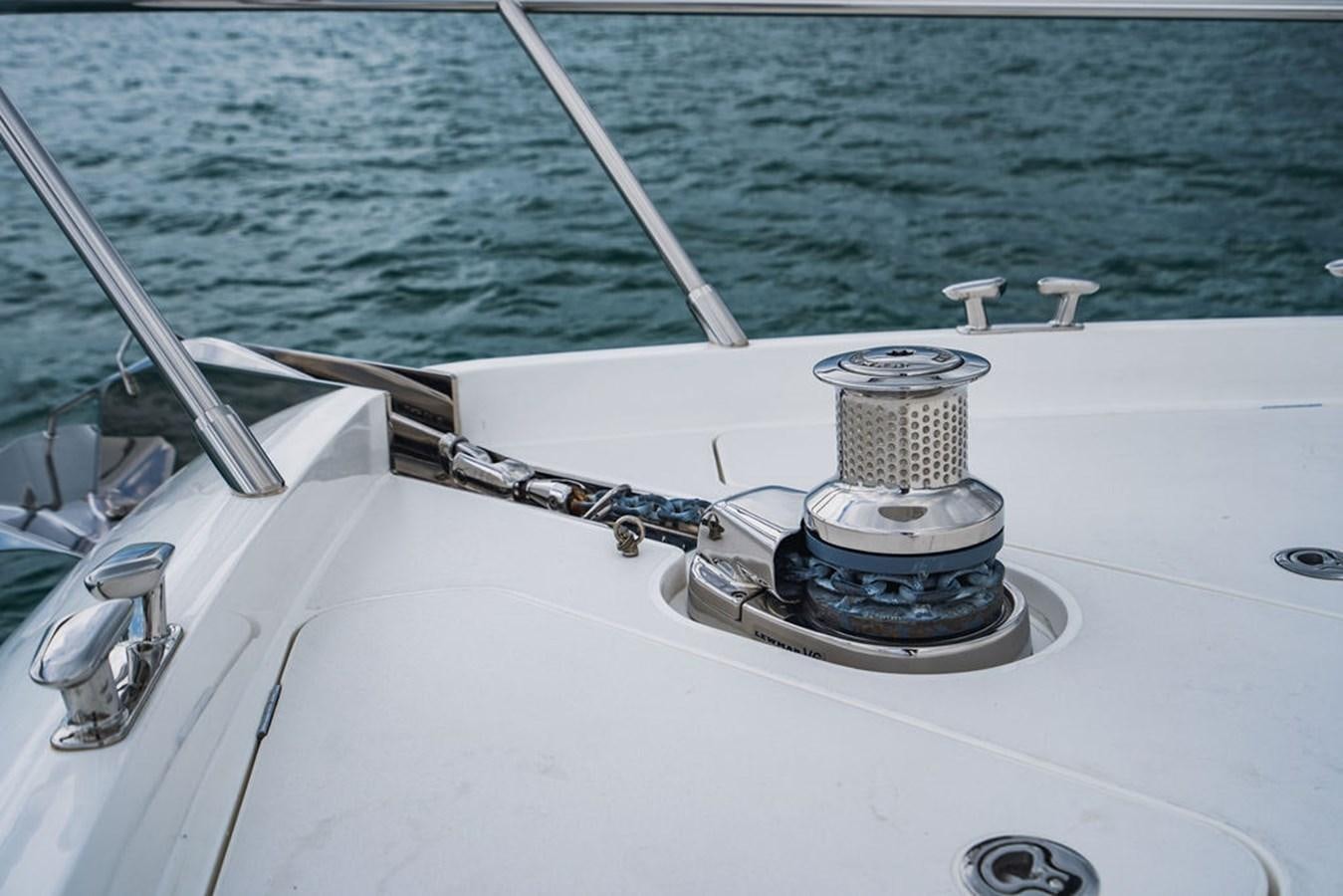 a boat with a metal object on the front aboard IMAGINE Yacht for Sale