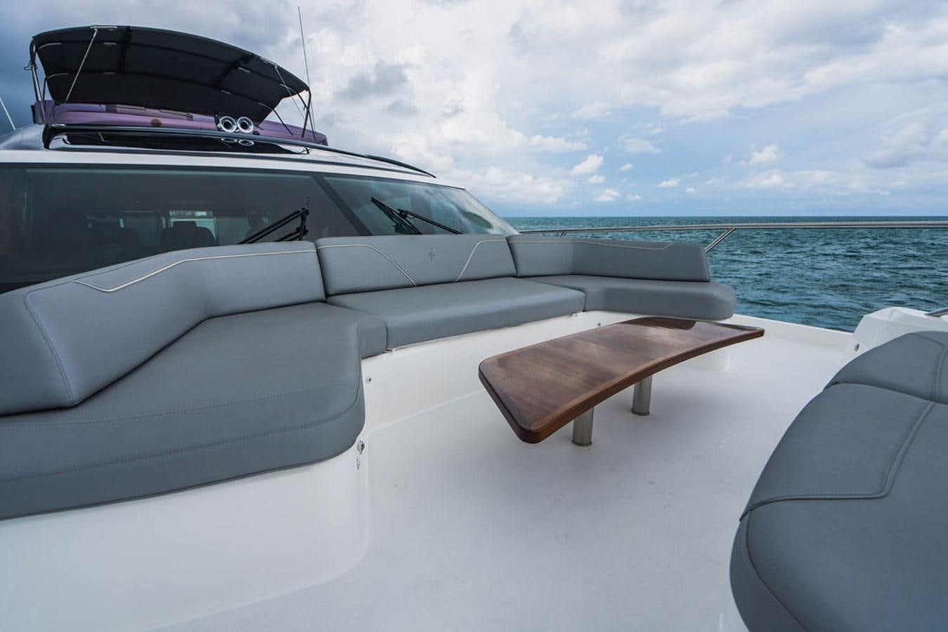 a car with a boat on the back aboard IMAGINE Yacht for Sale