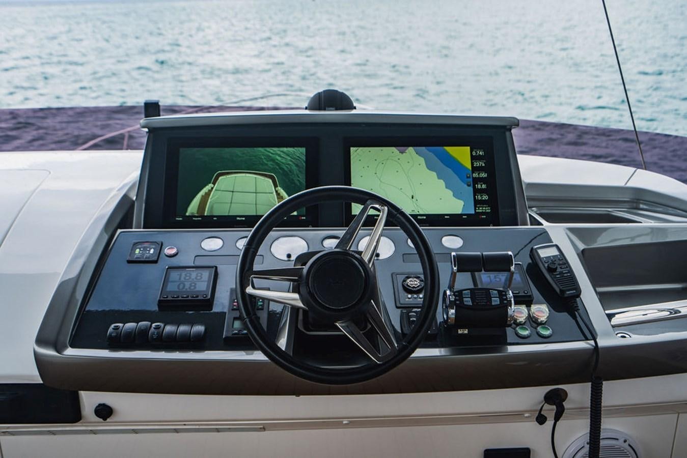 the inside of a car aboard IMAGINE Yacht for Sale