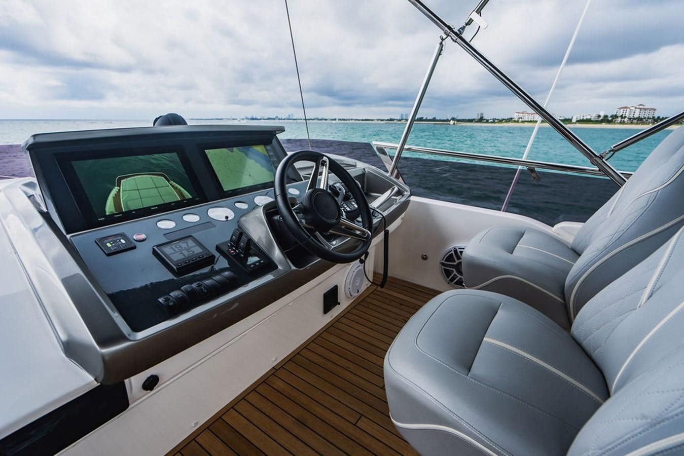 the inside of a car aboard IMAGINE Yacht for Sale