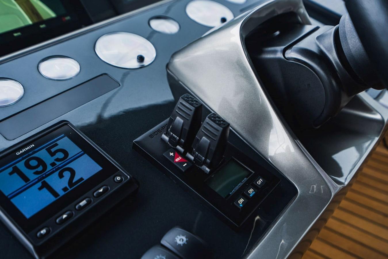 a car dashboard with a digital display aboard IMAGINE Yacht for Sale