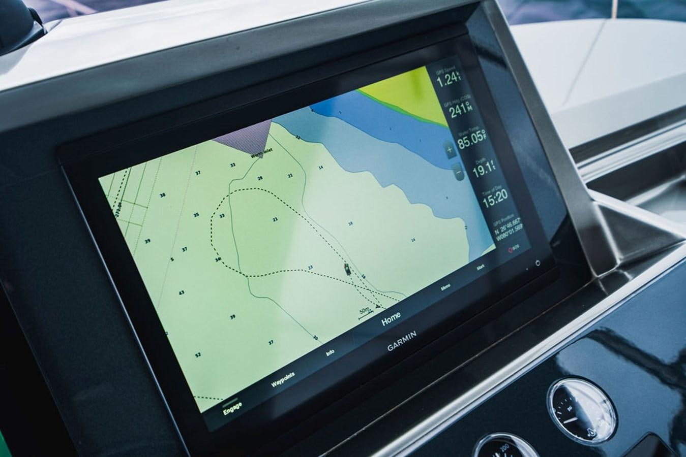 a tablet with a map on the screen aboard IMAGINE Yacht for Sale
