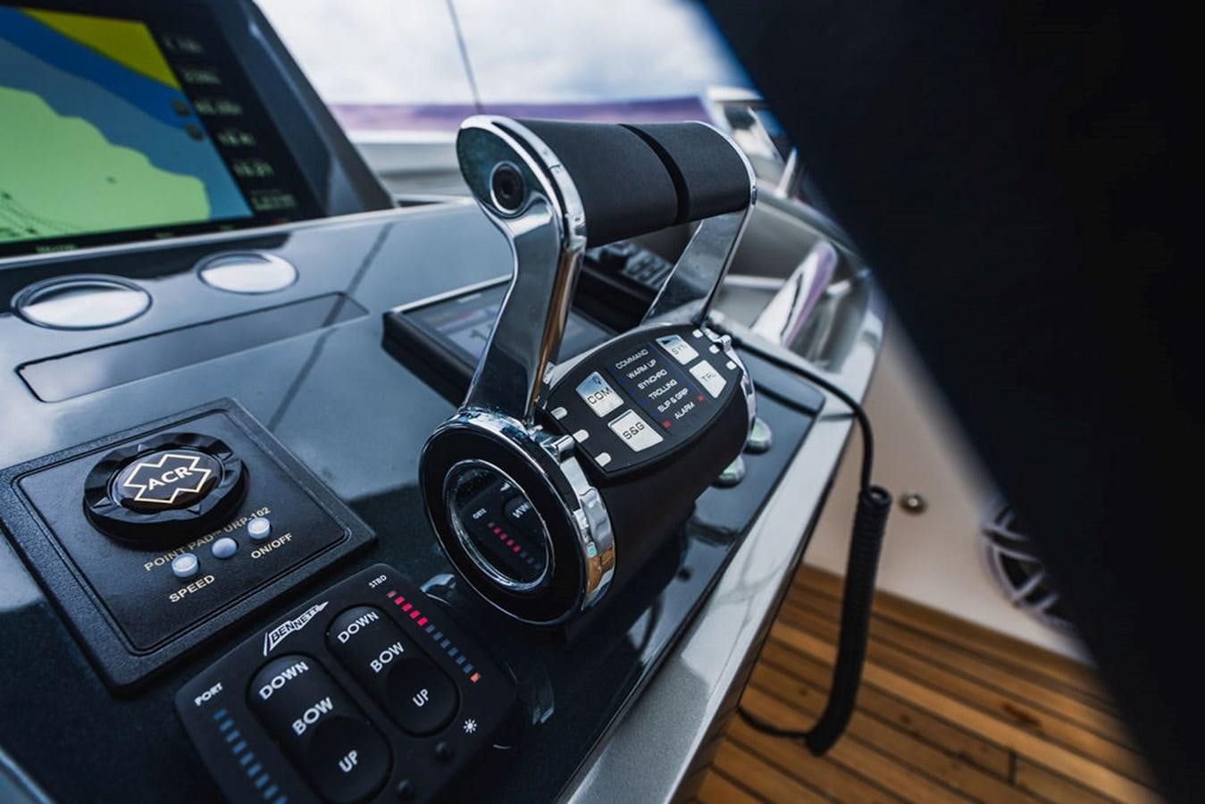 a car with a charging cord aboard IMAGINE Yacht for Sale