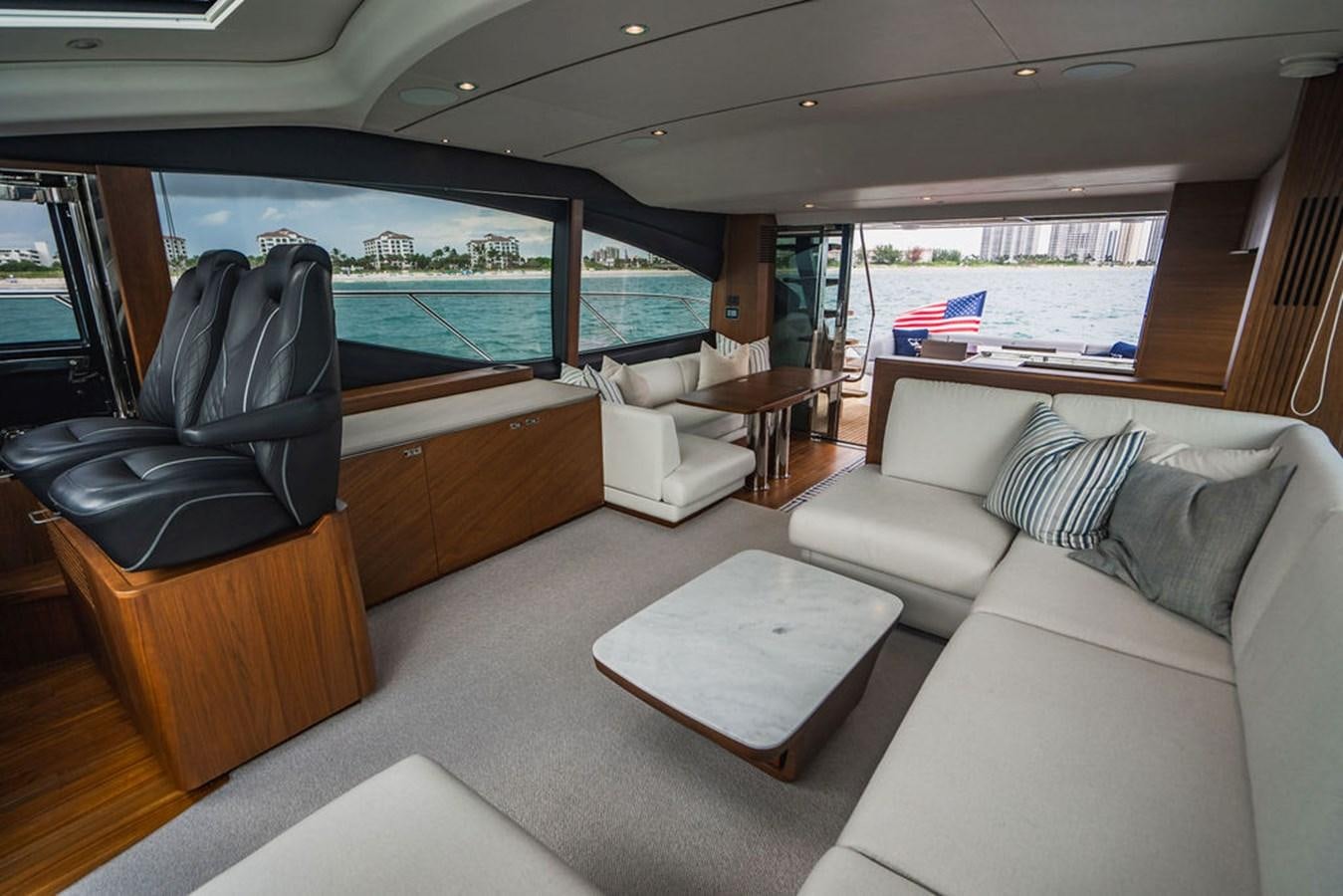 a car with a view of the ocean aboard IMAGINE Yacht for Sale
