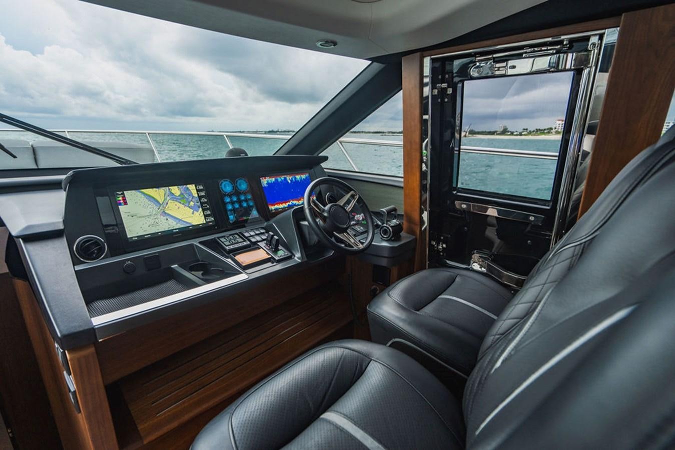 inside of a car aboard IMAGINE Yacht for Sale