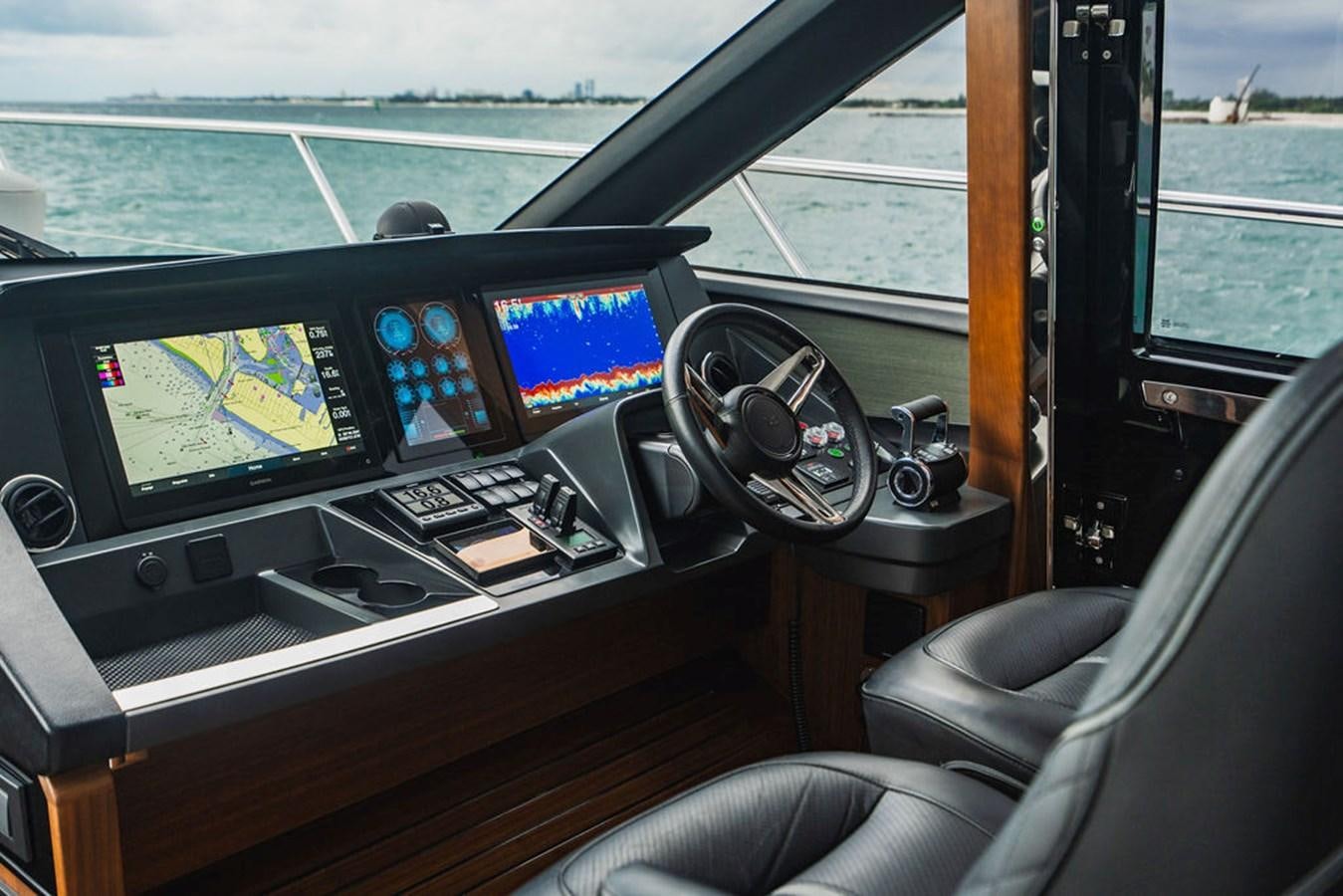 inside of a car aboard IMAGINE Yacht for Sale