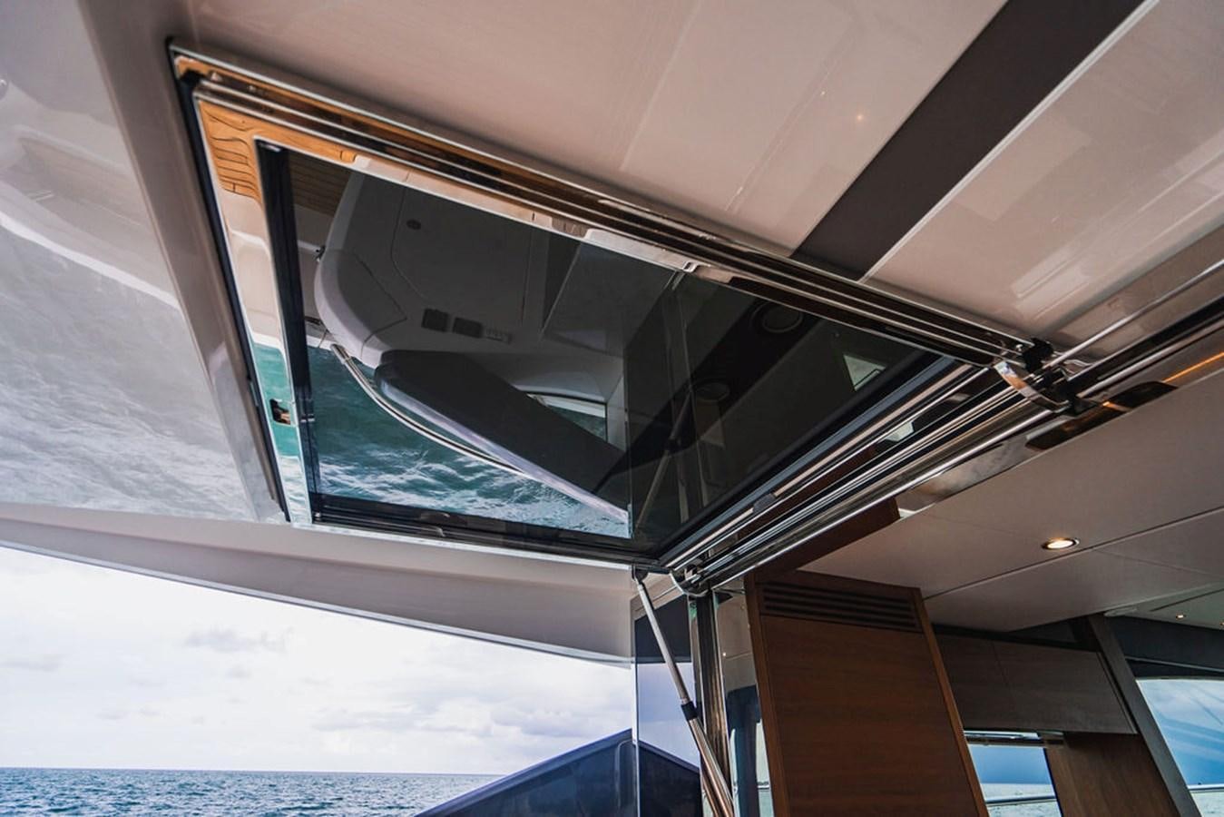 a building with a large window aboard IMAGINE Yacht for Sale