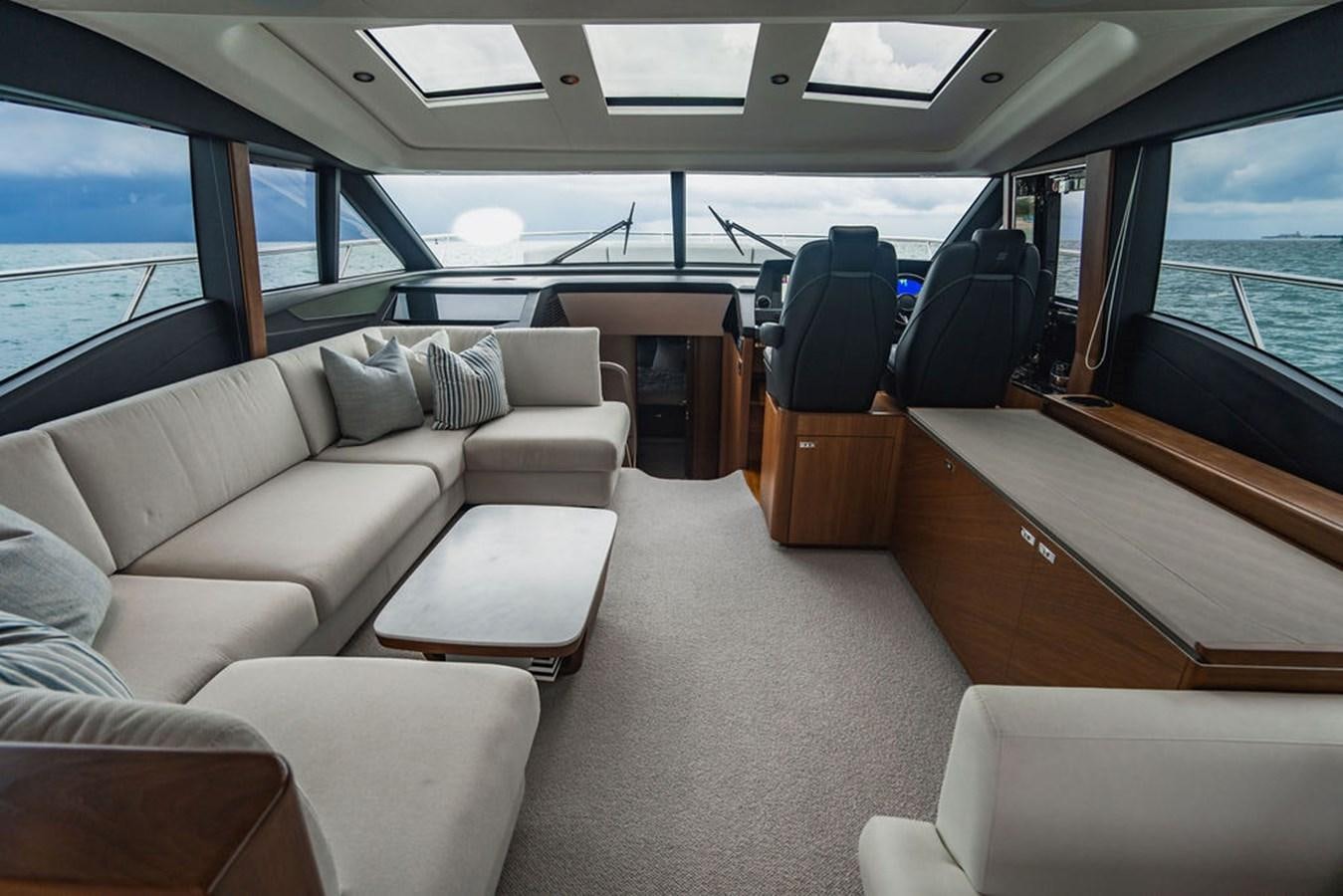 inside of a vehicle with seats aboard IMAGINE Yacht for Sale