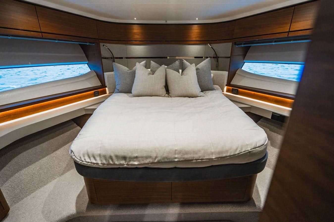 a bed in a room aboard IMAGINE Yacht for Sale