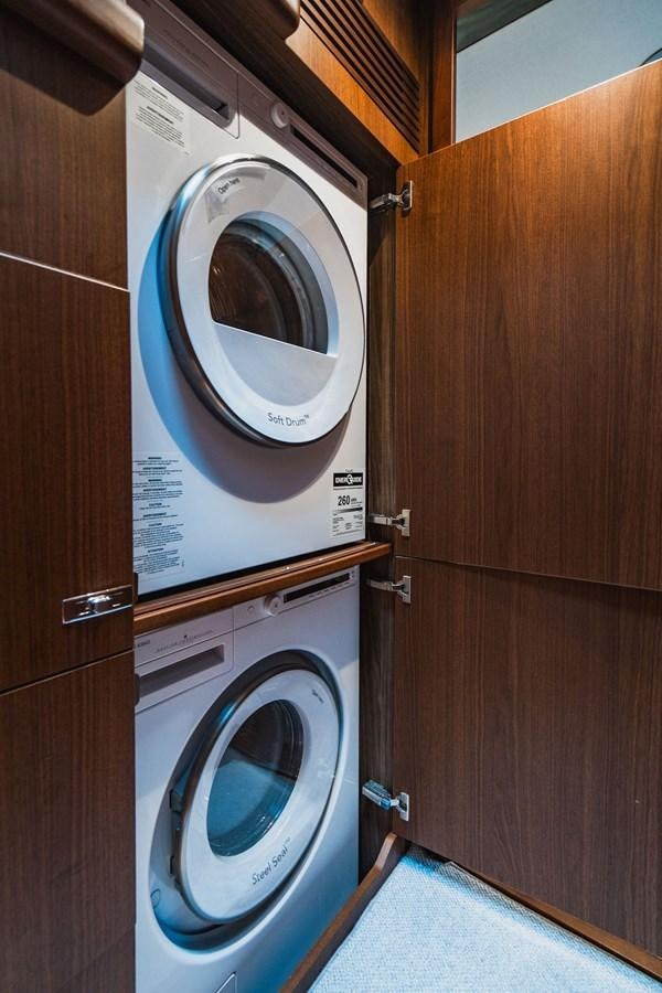 a white washing machine aboard IMAGINE Yacht for Sale