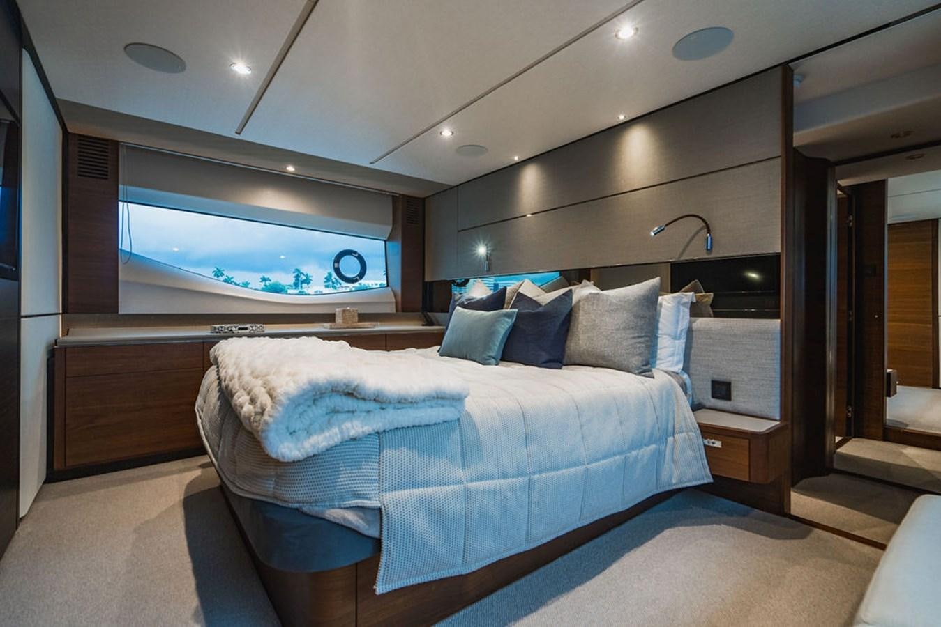 a bed in a room aboard IMAGINE Yacht for Sale