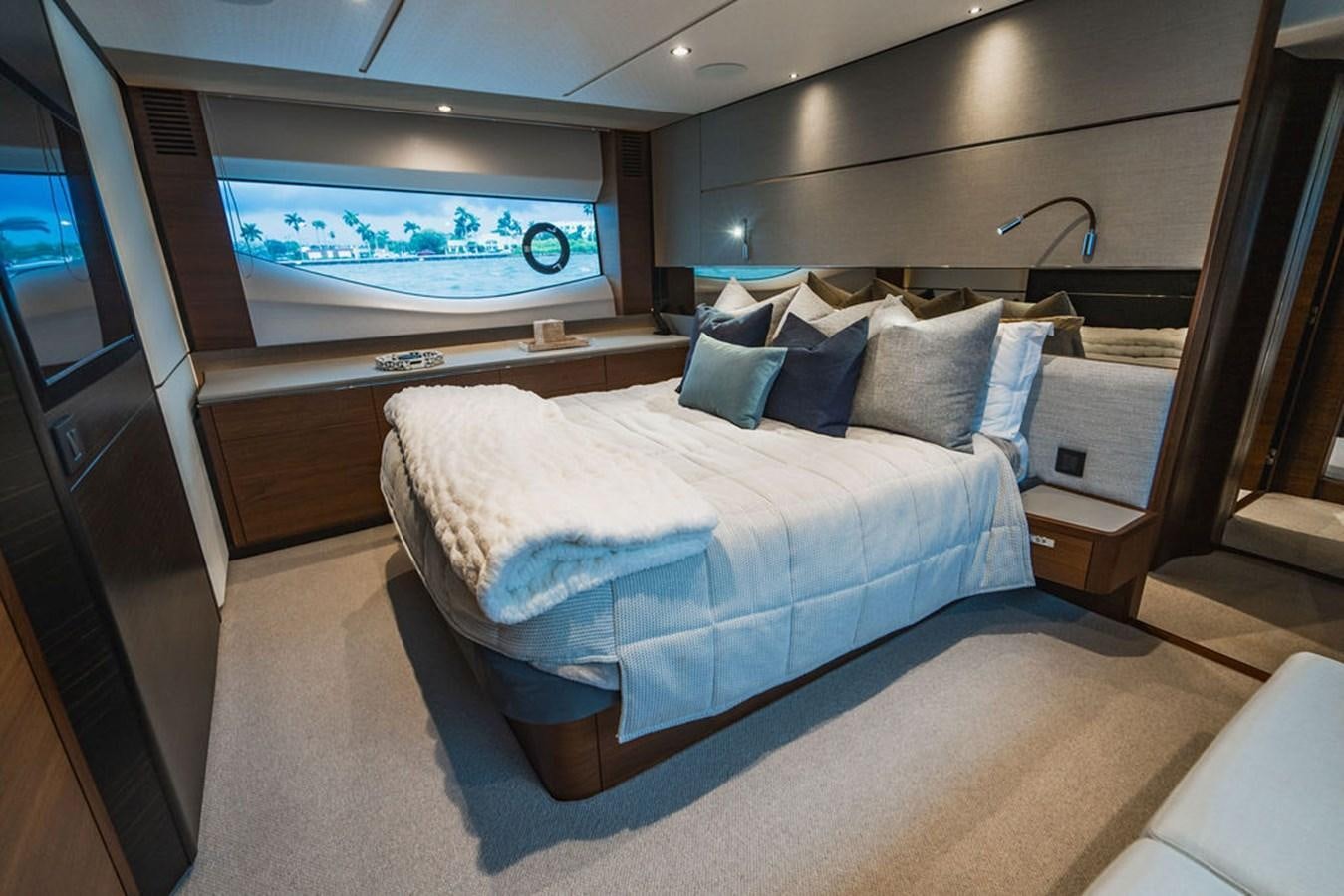 a bed in a room aboard IMAGINE Yacht for Sale