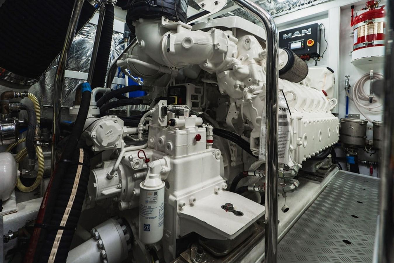 a machine with a large metal cylinder aboard IMAGINE Yacht for Sale