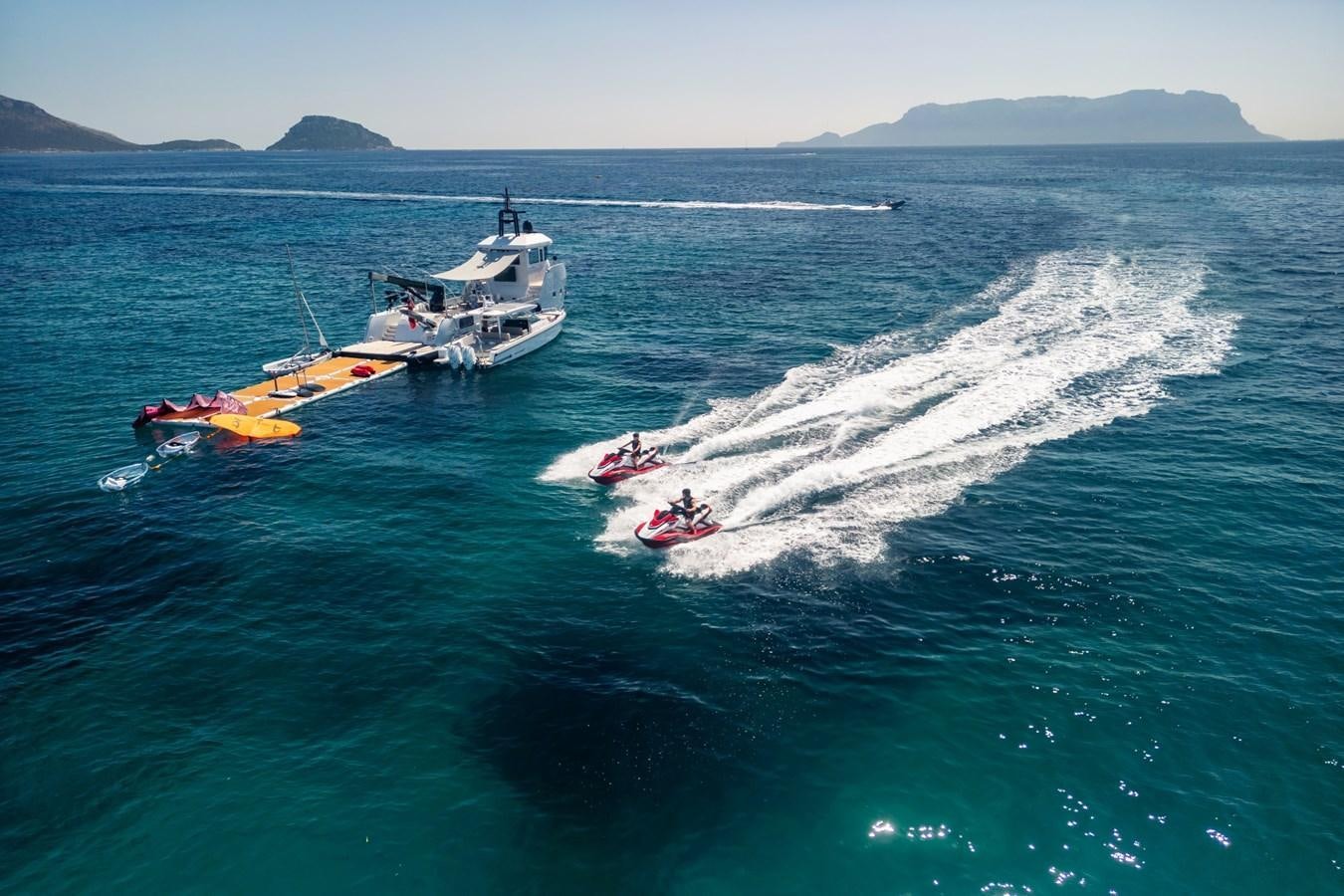 a boat and a helicopter in the water aboard SHADOW Yacht for Sale