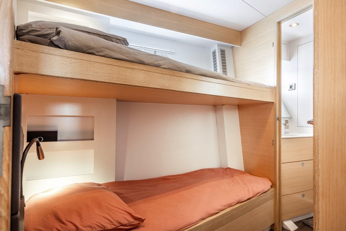a bed in a room aboard SHADOW Yacht for Sale