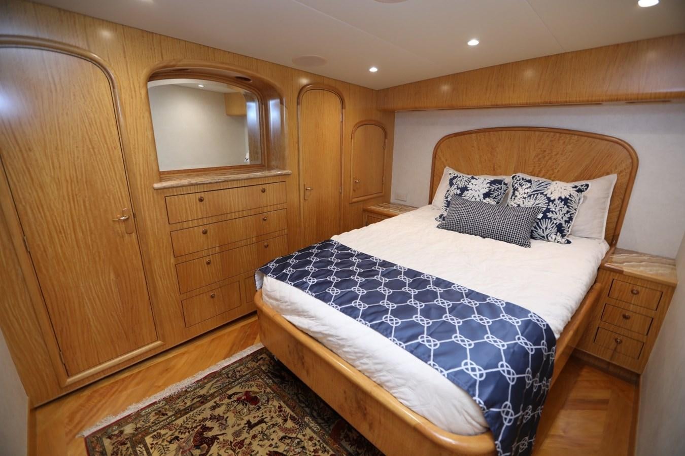 a bed in a room aboard WHISKEY KILO Yacht for Sale