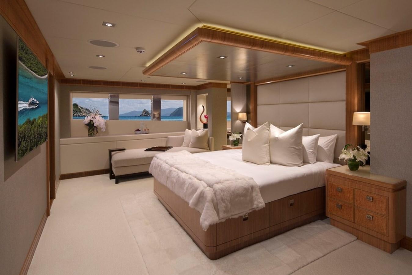 a large bedroom with a large bed aboard MUCHOS MAS Yacht for Sale
