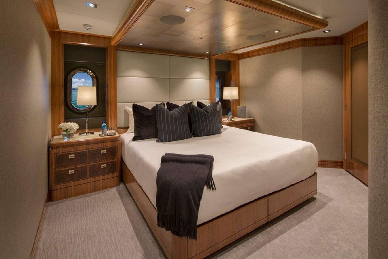 a bed in a hotel room aboard MUCHOS MAS Yacht for Sale