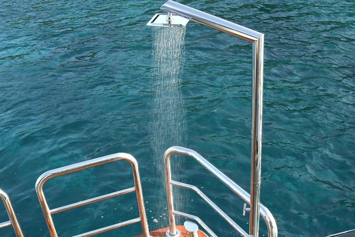 a boat in the water aboard MUCHOS MAS Yacht for Sale